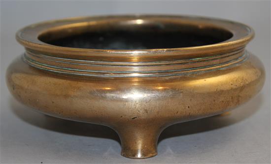 A Chinese bronze ding censer, Xuande four character mark, probably 17th / 18th century, 13.3cm